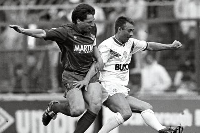 TOUGH SEASON: For Leeds United in 1987-88 as Glynn Snodin battles it out during the April clash against Millwall. Picture by Varleys.