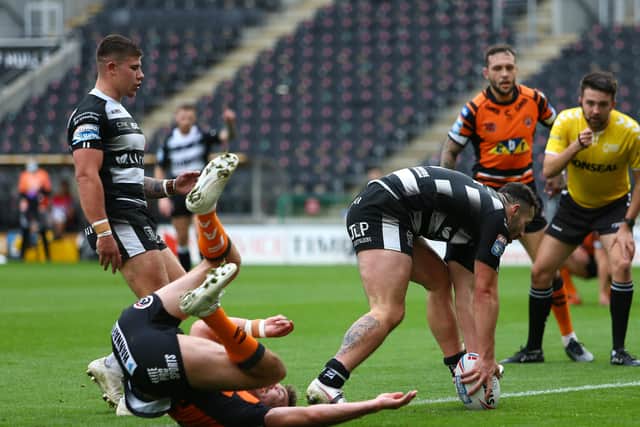 Dotting down: Jake Connor of Hull FC scores one of his team's eight tries. Picture by Ash Allen/SWpix.com