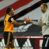 Wolverhampton Wanderers' manager Nuno Espirito Santo and winger Adama Traore celebrate their victory at Sheffield United. Traore could be a big threat to Leeds United tomorrow.  Picture: PA Wire.