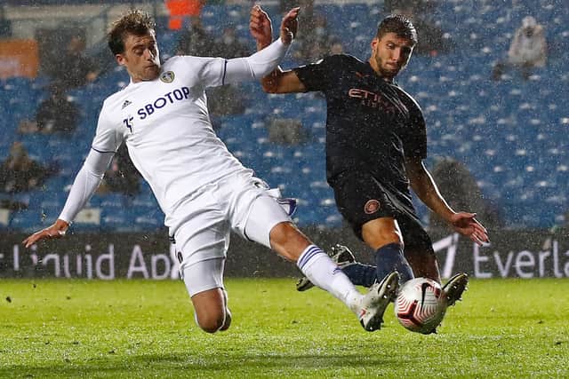 NO BLOCK TARGETS: For Leeds United or Patrick Bamford, left, pictured being challenged by Manchester City's Ruben Dias in the 1-1 draw at Elland Road before the October break. Photo by Jason Cairnduff - Pool/Getty Images.