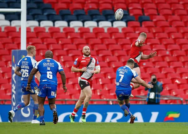 Leeds Rhinos' Luke Gale kicks the winning drop goal in the Challenge Cup final on Saturday. Picture: Ed Sykes/SWpix.com.