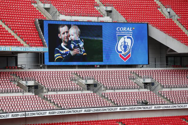 Leeds Rhinos legend Rob Burrow appears on the big screen before the Challenge Cup final yesterday. Picture: Ed Sykes/SWpix.com.
