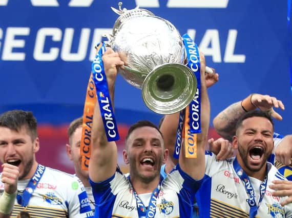 Luke Gale lifts the trophy after the Coral Challenge Cup Final at Wembley. PIC: PA