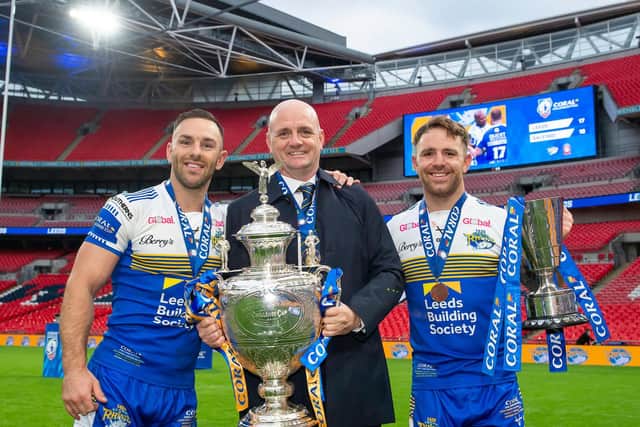 Lance Todd trophy winner Richie Myler, right, with Leeds Rhinos captain Luke Gale and coach Richard Agar. Picture by SWpix.com.