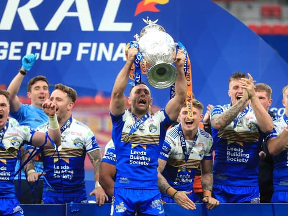 Leeds Rhinos' Luke Gale lifts the trophy after the Coral Challenge Cup Final at Wembley Stadium.