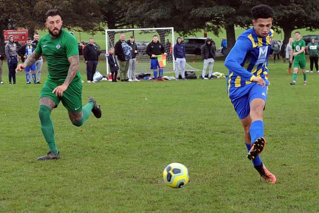 Tylor Phillips-Noel scores the second goal for FC North Leeds against Sporting Pudsey. Picture: Steve Riding.