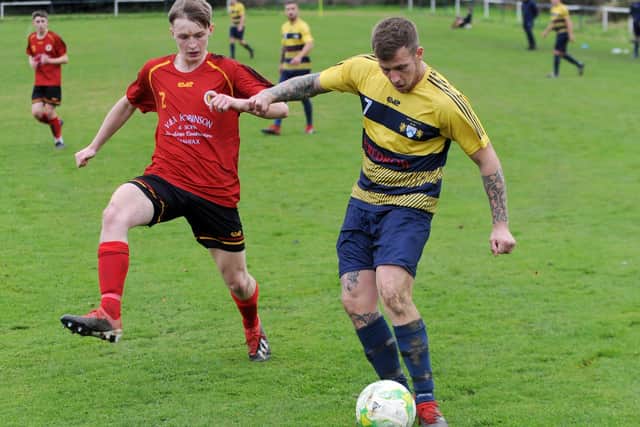 Paddy Wilkinson, of Swillington Saints Welfare, fires off a shot against Brighouse Sports. Picture: Steve Riding.