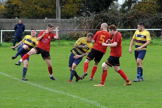 Josh Findlay shoots for Swillington Saints Welfare during their 5-3 defeat to visitors Brighouse Sports in West Yorkshire League Division Two. Picture: Steve Riding.