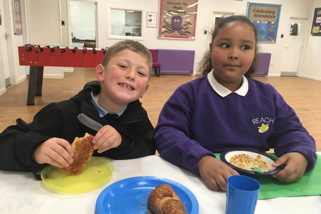 Children at Reach Primary School in Beeston enjoying a breakfast provided by Tesco’s Community Food Connection Scheme.
