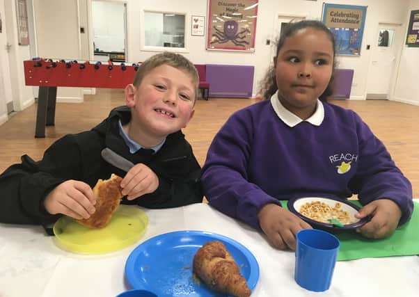Children at Reach Primary School in Beeston enjoying a breakfast provided by Tesco’s Community Food Connection Scheme.