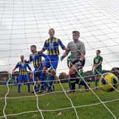 FC North Leeds inflicted the first defeat of the season on Sporting Pudsey with a 2-0 win in Division 4 of the Leeds Combination League. 
Dan Hurle, left, pictured opening the scoring for FC North Leeds. Picture: Steve Riding.