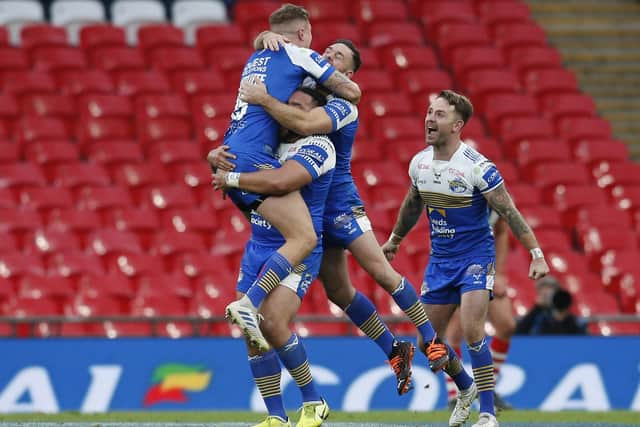 Leeds Rhinos players celebrate after the final hooter at Wembley. Picture: Ed Sykes/SWpix.com.