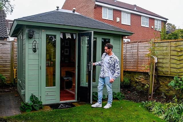 Harry Potter fans Dan Harrison (pictured) and partner Mark Parkinson have transformed the summerhouse in the garden of their home at Thorner  into  wizarding  pub The Leaky Cauldron.
Photo: James Hardisty