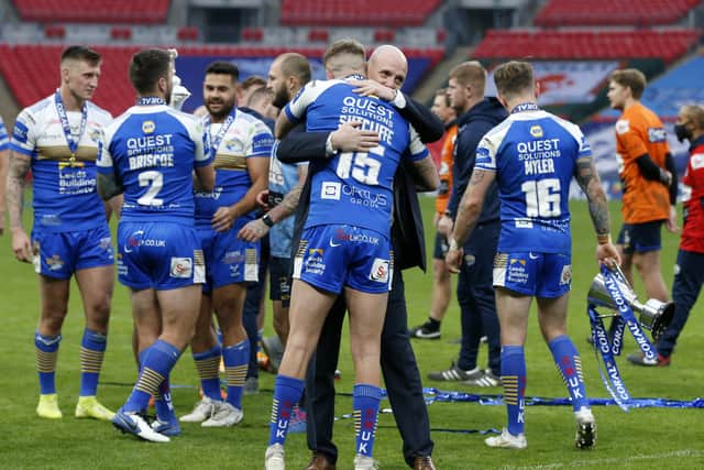 Leeds Rhinos head coach Richard Agar celebrates with  Liam Sutcliffe after the Challenge Cup final victory. Picture: Ed Sykes/SWpix.com.