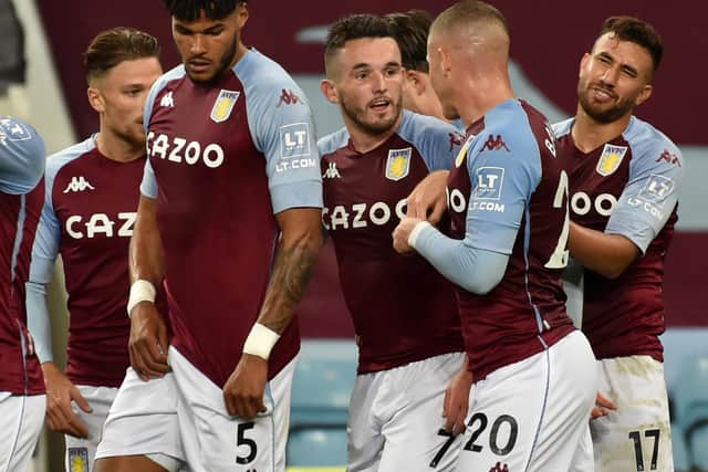 WAITING TO POUNCE - John McGinn, centre, is part of the Aston Villa midfield, expected to play against Leeds United tomorrow night. Pic: Getty