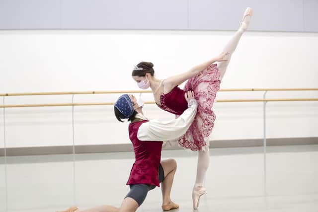 Dancers from the Northern Ballet Lorenzo Trossello and Dominique Larose wear face coverings as they rehearse a duet from Sleeping Beauty at the Northern Ballet in Leeds, ahead the their first live performances in more than seven months. Image: Danny Lawson/PA Wire