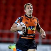 Castleford Tigers' Greg Eden: On his way to score his side's fourth try against Hull KR at the Totally Wicked Stadium, St Helens. Picture: PA