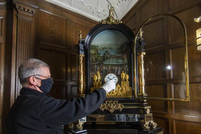 Michael Clark, visitor assistant at Temple Newsam House, adjusts the time on the Pyke Clock ready for when the clocks go back at 2am on Sunday October 25.
Picture Tony Johnson