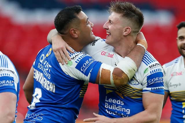 Leeds Rhinos' Alex Mellor and Ava Seumanufagai celebrate after the Challenge Cup final. Picture: Ed Sykes/SWpix.com.