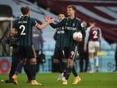 SIX APPEAL: Leeds United striker Patrick Bamford is congratulated by team mate Luke Ayling after his hat-trick in Friday's 3-0 win at Aston Villa took him to half a dozen goals already for the new campaign. Photo by Nick Potts - Pool/Getty Images