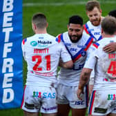 Double up: Wakefield Trinity players celebrate Eddie Battye's try in the Super League thrashing of Hull KR on Sunday. Picture James Hardisty.