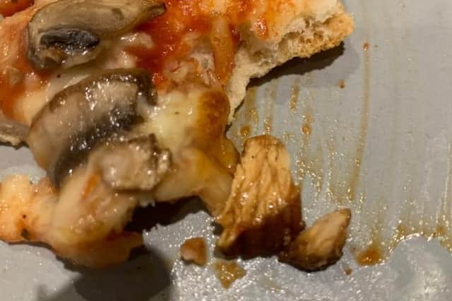 The 'Vegetable Supreme' pizza containing chicken