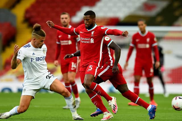 PRAISE: From Leeds United's Kalvin Phillips, left, for Whites head coach Marcelo Bielsa who said the midfielder could still improve on his display against Liverpool, above. Photo by Andrew Powell/Liverpool FC via Getty Images.