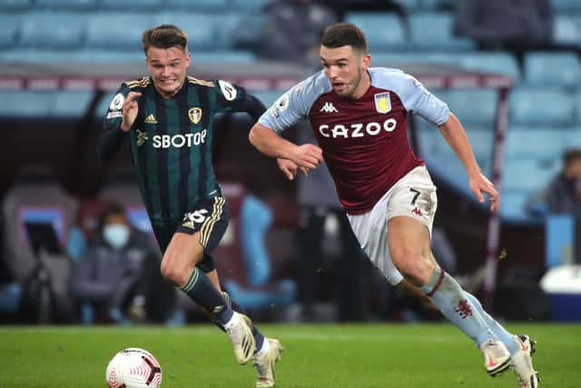 Leeds United's Jamie Shackleton battles for the ball with Aston Villa's John McGinn. Picture: Nick Potts/PA Wire.