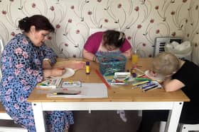 A kitchen table is transformed into a painter’s workshop as part of Artlink West Yorkshire’s plan help people access the joy of art.