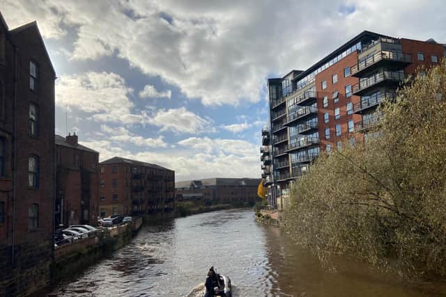 Police searching the River Aire near Dock Street