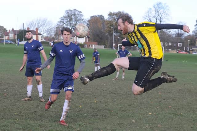 Mike Smythe heads goalwards for Beck and Call who would have gone top with a win but West Yorkshire Falcons scored a 90th-minute equaliser for 2-2. Picture: Steve Riding.