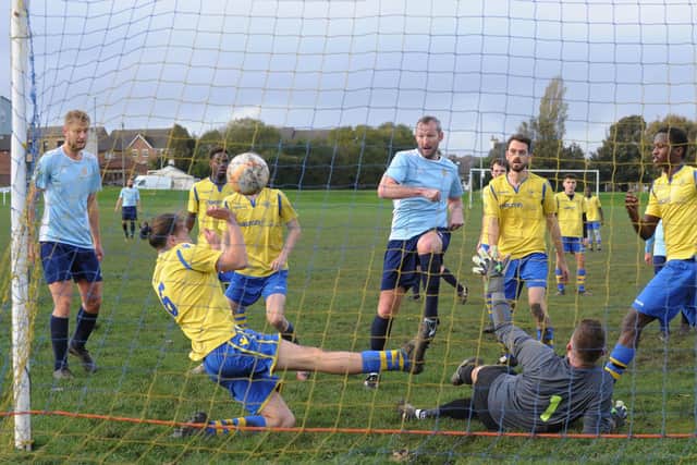 Andy Shields scores for Farsley Celtic Juniors in the win at Drighlington. Picture: Steve Riding.