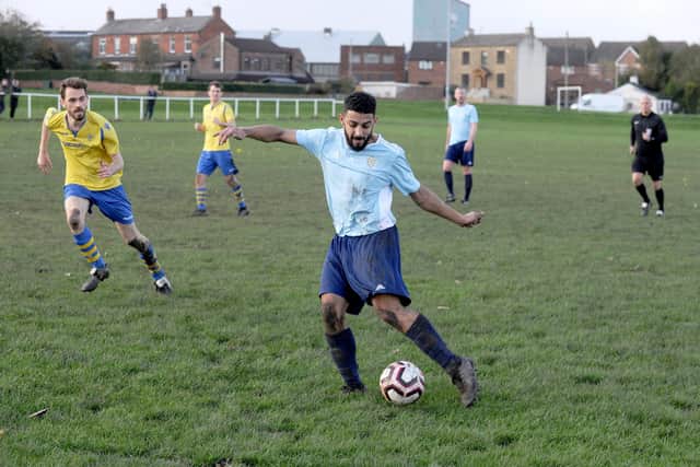 Danny Lyons scores for Farsley Celtic Juniors in the win at Drighlington. Picture: Steve Riding.