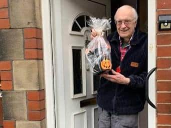 Donald Atkinson received the 1000th portion of 'lockdown fish and chips' from Aireborough Voluntary Services to the Elderly (AVSED) charity.