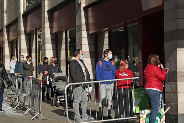 Shoppers queue outside Wilko in Leeds ahead of the national lockdown (Photo: Danny Lawson/PA Wire)