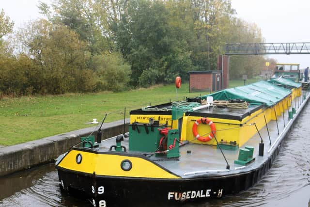 The 50-year-old barge Fusedale H having completed the first commercial barge deliveries to Leeds in 20 years, leaving the Knostrop Lock, in Leeds. Photo taken by Maik Brown.