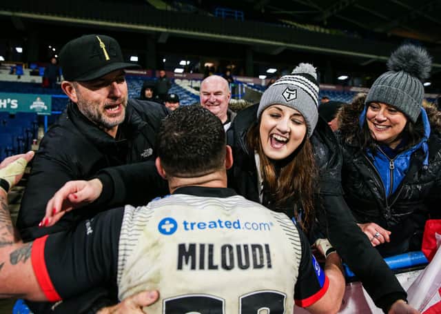 Toronto Wolfpack fans celebrate with Hakim Miloudi after their Challenge Cup victory over Huddersfield Giants back in March – after what turned out to be their final game of the 2020 campaign. Picture: Alex Whitehead/SWpix.com.
