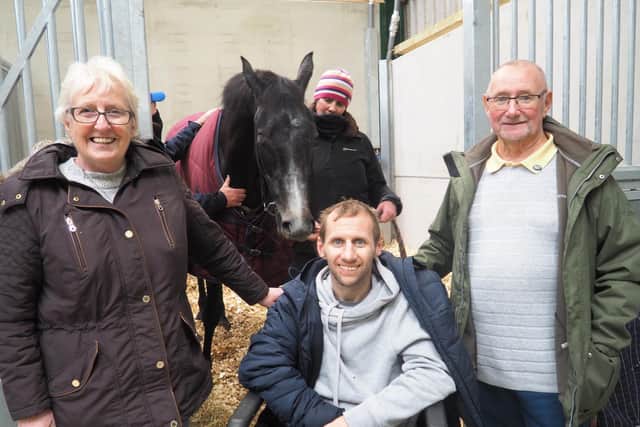 Rob Burrow, with parents Irene and Geoff, meet racehorse Burrow Seven.