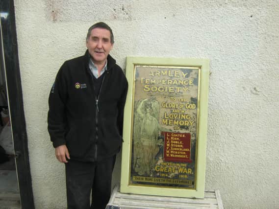 Andy Dalton, of Leeds City Mission, with the war memorial in Armley which was discovered during a building renovation.