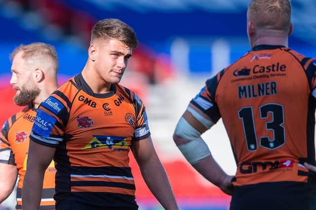 Jacques O'Neill, centre, with Tigers teammates Paul McShane and Adam Milner. Picture by Allan McKenzie/SWpix.com.