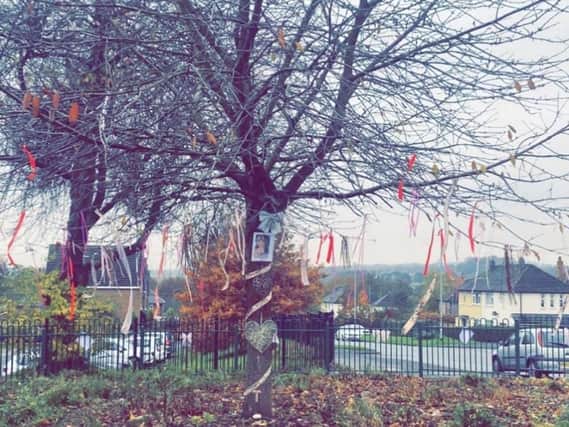 Laura Wilson has put up decorations and photographs across Moortown in tribute to her older sister Tori. Photo provided by the family.