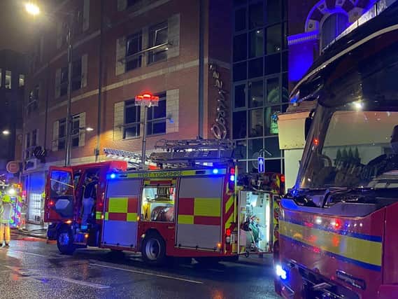 Police are investigating the cause of the fire at Roomzzz hotel in Leeds (Image: Terry George)