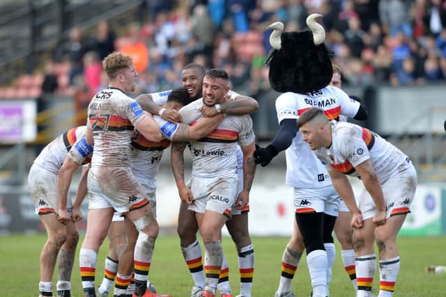 The Bradford Bulls celebrate beating Leeds Rhinos in last year's Challenge Cup - could the two rivals meet each other again in Super League next season?  Picture: Bruce Rollinson