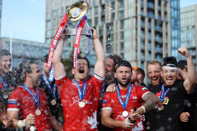Toronto Wolfpack celebrate their Betfred Championship Trophy triumph and, with it, a place in Super League 2020. Picture: Vaughn Ridley/SWpix.com.