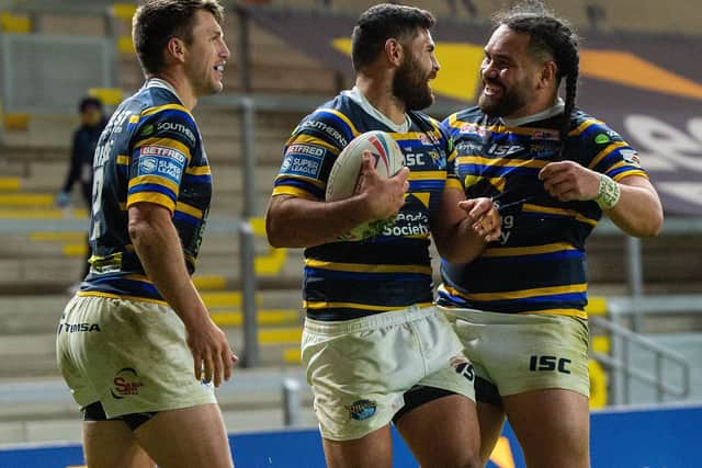 Rhyse Martin celebrates with Konrad Hurrell and Tom Briscoe after scoring against Castleford Tigers. Picture: Bruce Rollinson.