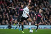 OLD FOES - Leeds United's Liam Cooper and Fulham's Aleksandar Mitrović face off again as Scotland take on Serbia in the Euro2020 qualifying play-off final tomorrow night. Pic: Getty