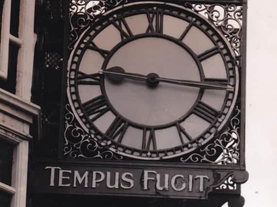 Tempus fugit at the most famous clock in Leeds in December 1990 - but not all that much.