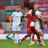 NICE FEELING - Luke Ayling held his own against Sadio Mané in Leeds United's first Premier League game against Liverpool at Anfield. Pic: Getty