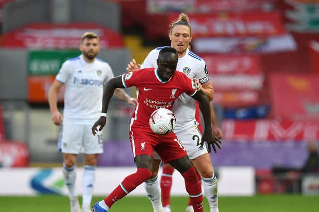 NICE FEELING - Luke Ayling held his own against Sadio Mané in Leeds United's first Premier League game against Liverpool at Anfield. Pic: Getty