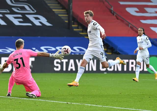 Patrick Bamford scores the goal against Crystal Palace which was then disallowed following a VAR check. Picture: Glyn Kirk - Pool/Getty Images.